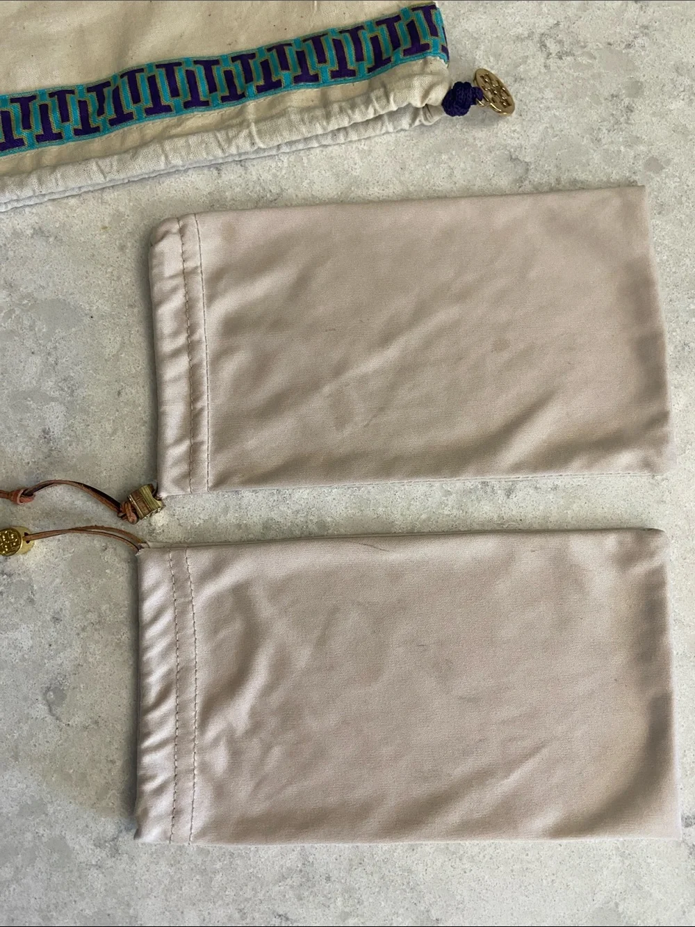 Tory Burch Dust Bag and 2 soft sunglass protective bags.
